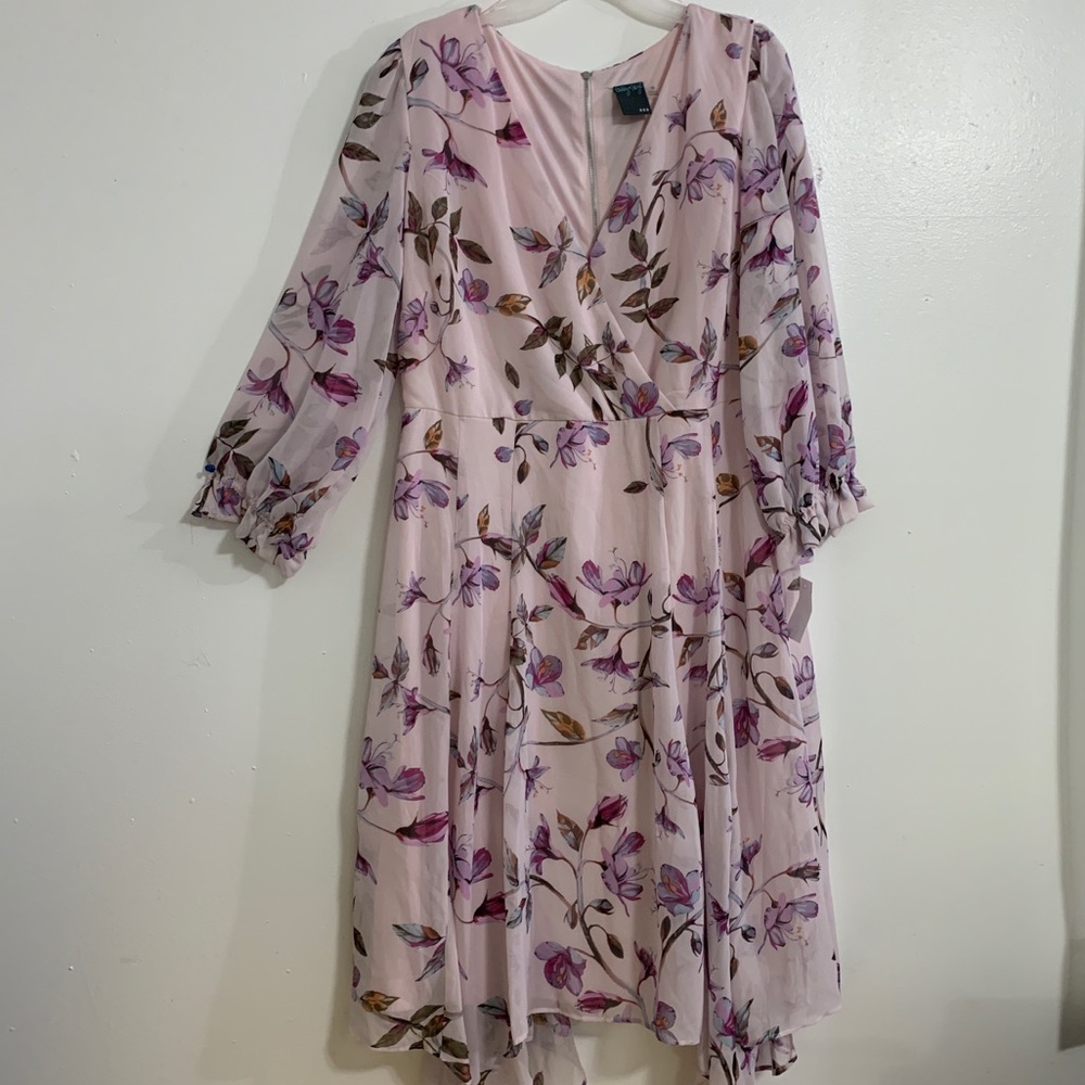 A gorgeous floral dress, with sheer sleeves.